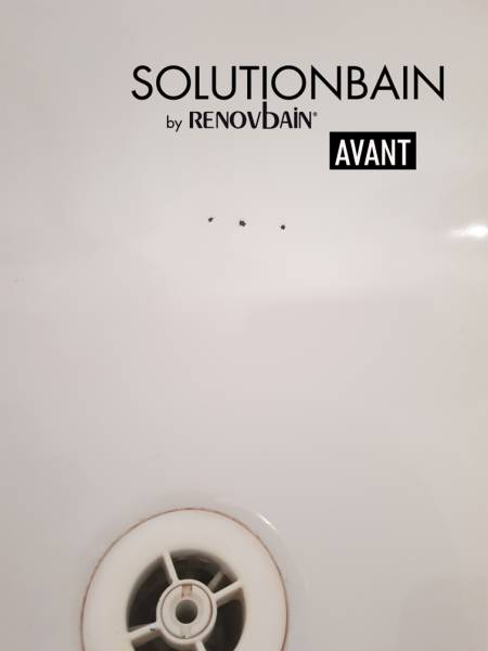 Réparation d'éclat de baignoire.